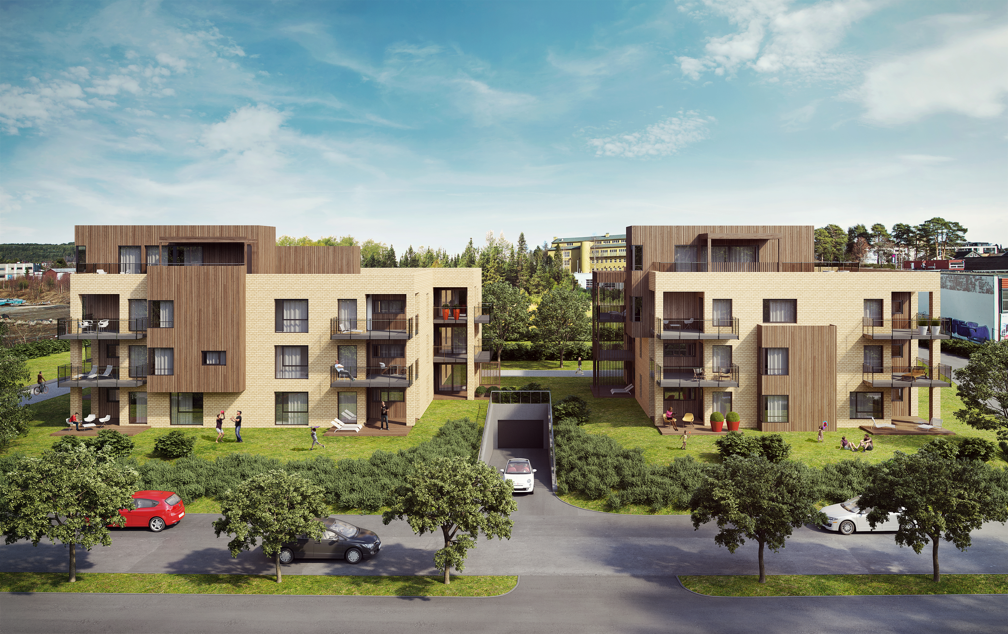 en bygård med en bil parkert foran.